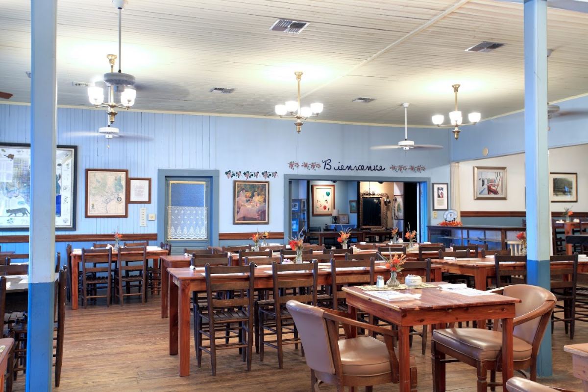 The Brazos Belle dining room with antique oak tables